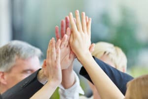 Gesundheitsmanagement in Unternehmen: Team-Spirit gegen Burnout